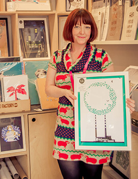 A staff member shows us some of the great art