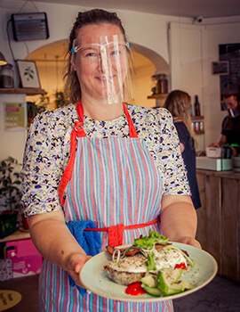 A staff member serves our food