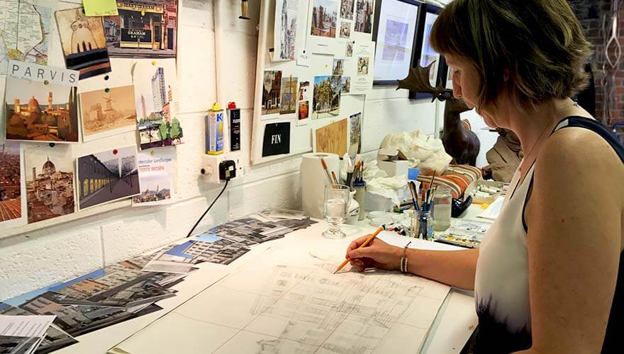 Elizabeth, drawing at her desk