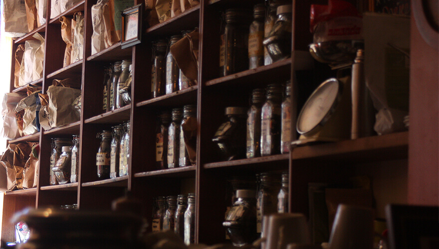 A wall of tea containers